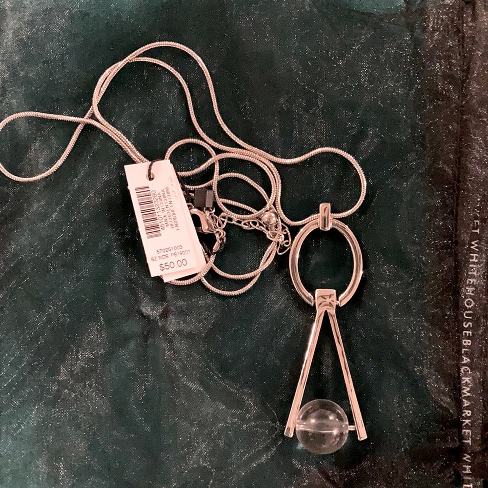 White House Black Market long silver pendant